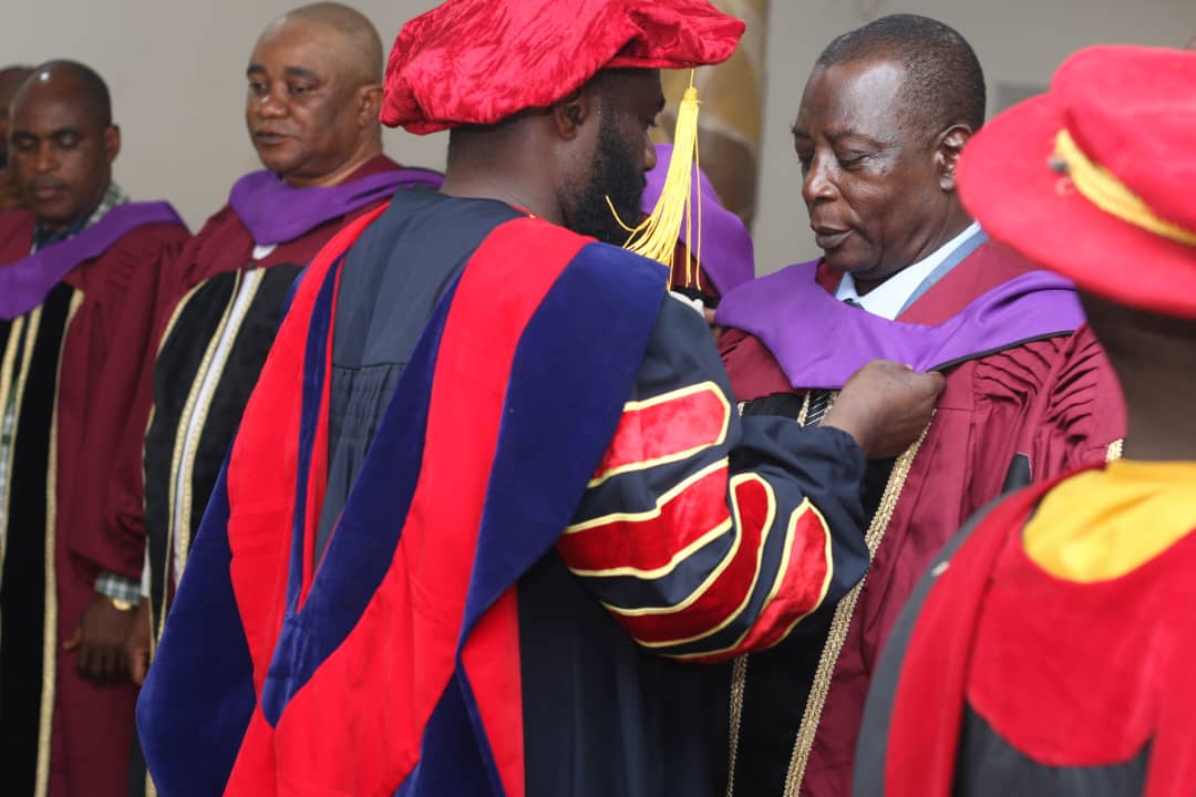 A hooding at the ICOF Global University 2024 congregation