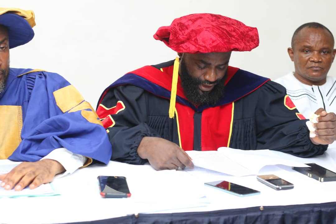 Students at the registration desk of ICOF Global University